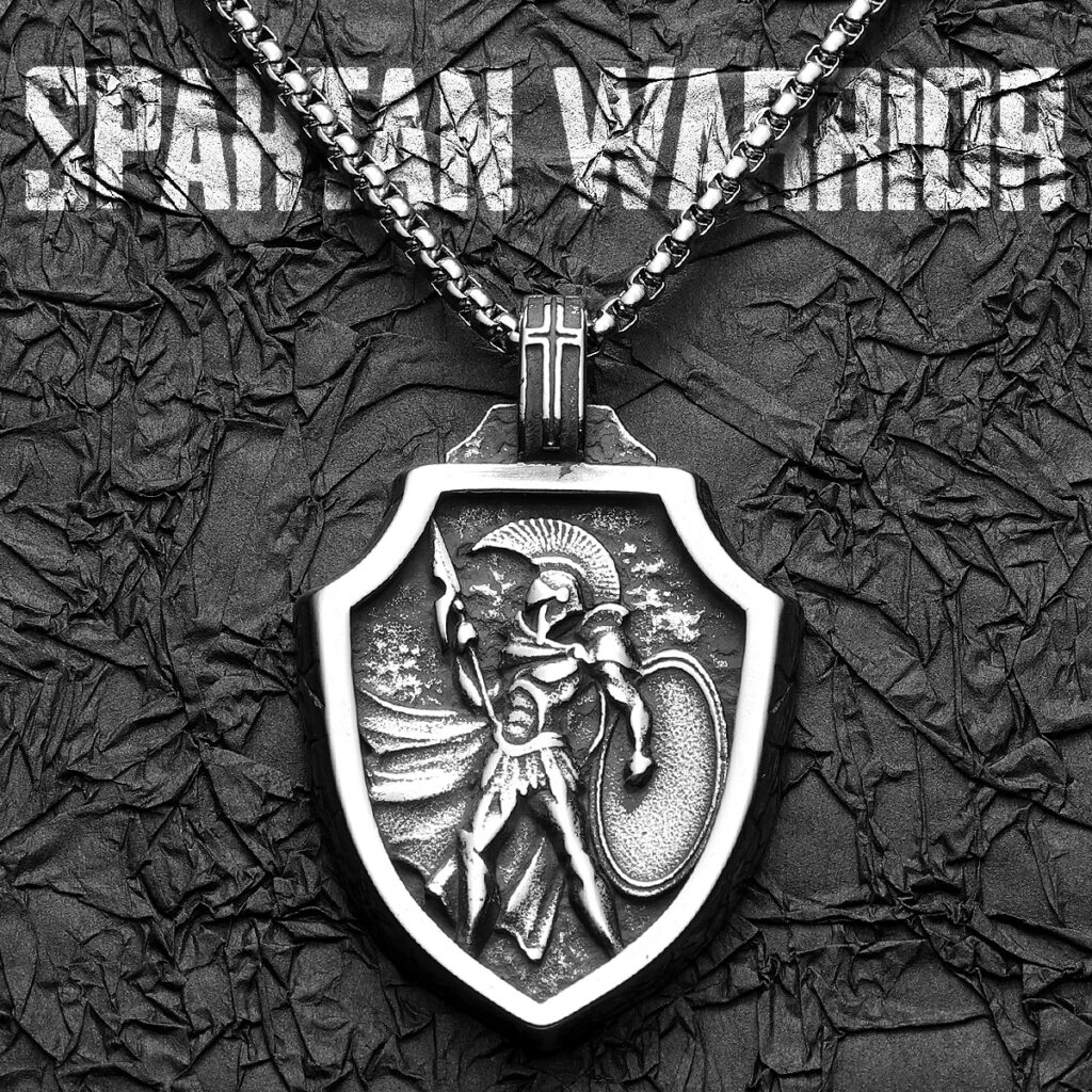 Pendentif spartiate en forme de bouclier avec guerrier grec