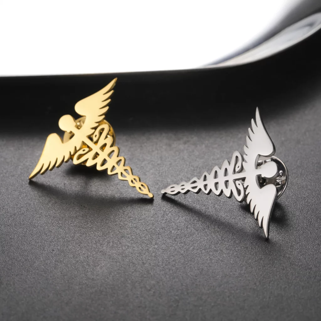 Broche caducée grecque ailée en acier inoxydable
