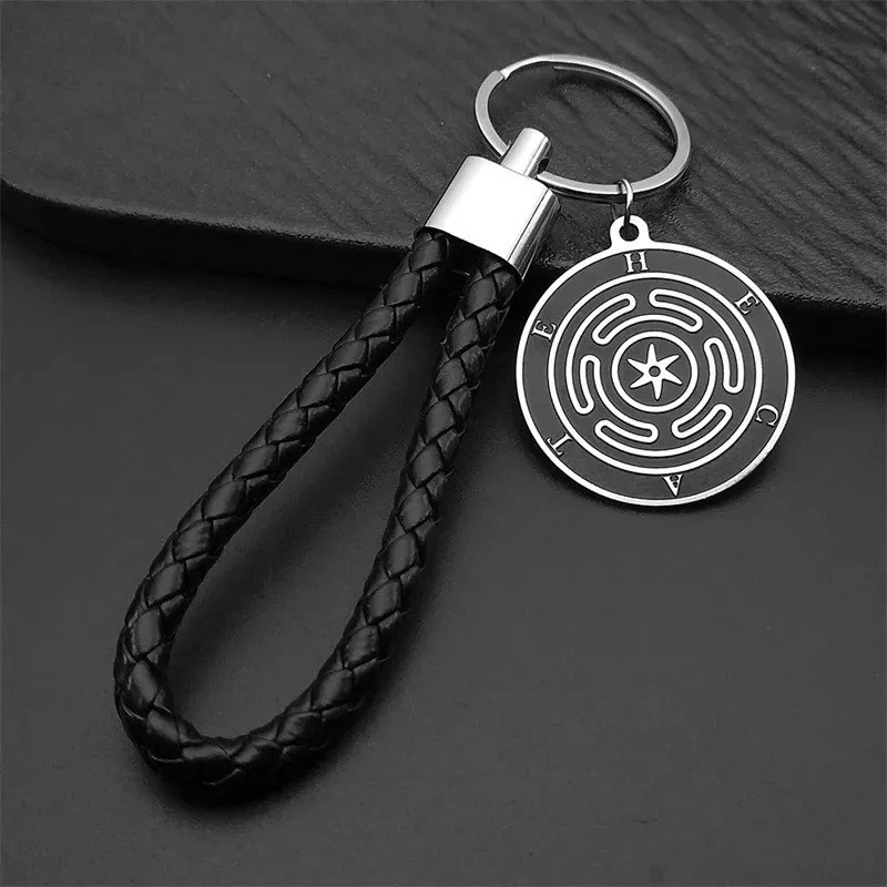 Porte-clés Hécate – roue magique en acier et similicuir noir