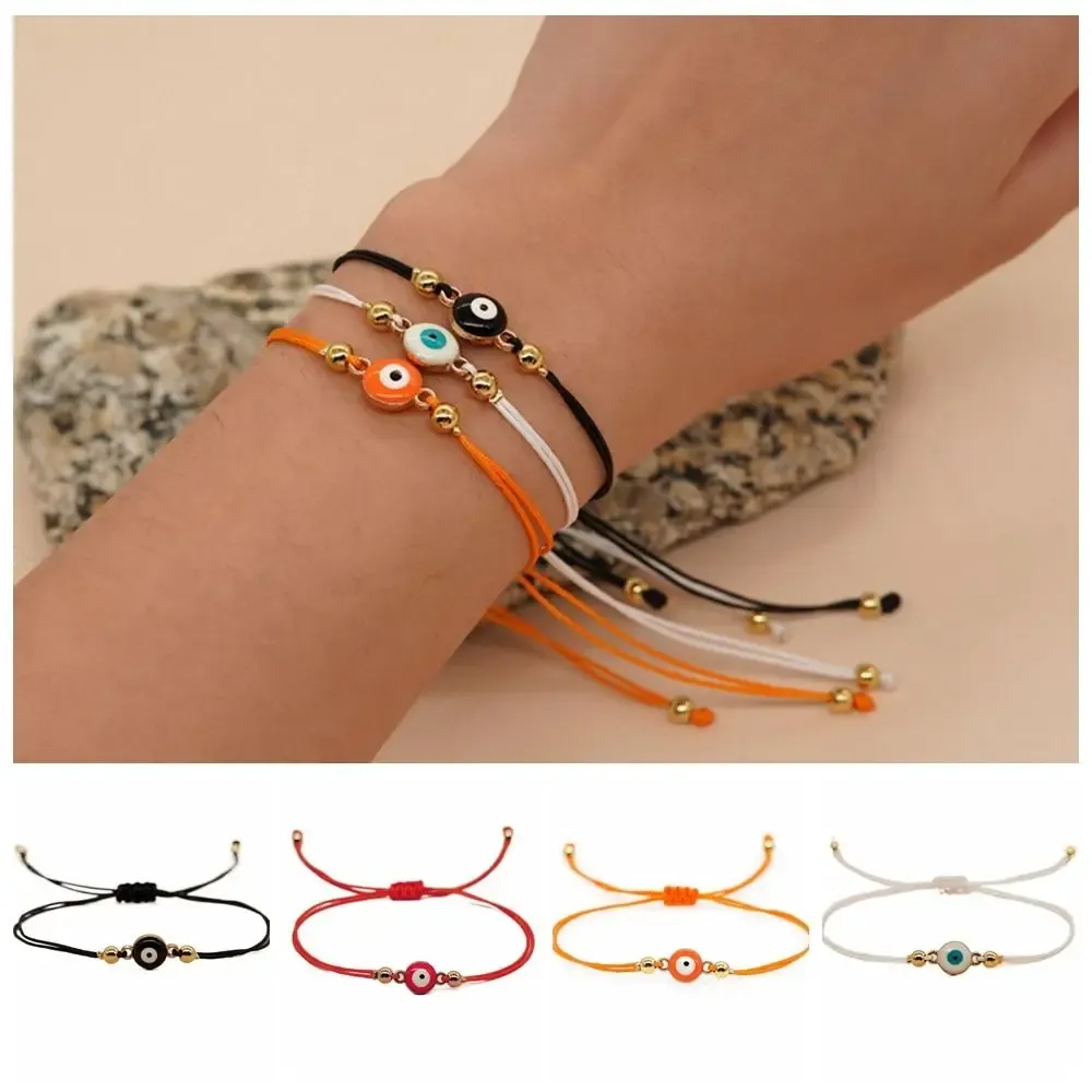Bracelet œil grec orange – cordon orange et perles dorées
