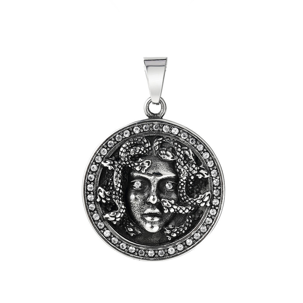 Pendentif noir représentant le visage de Méduse entouré de serpents